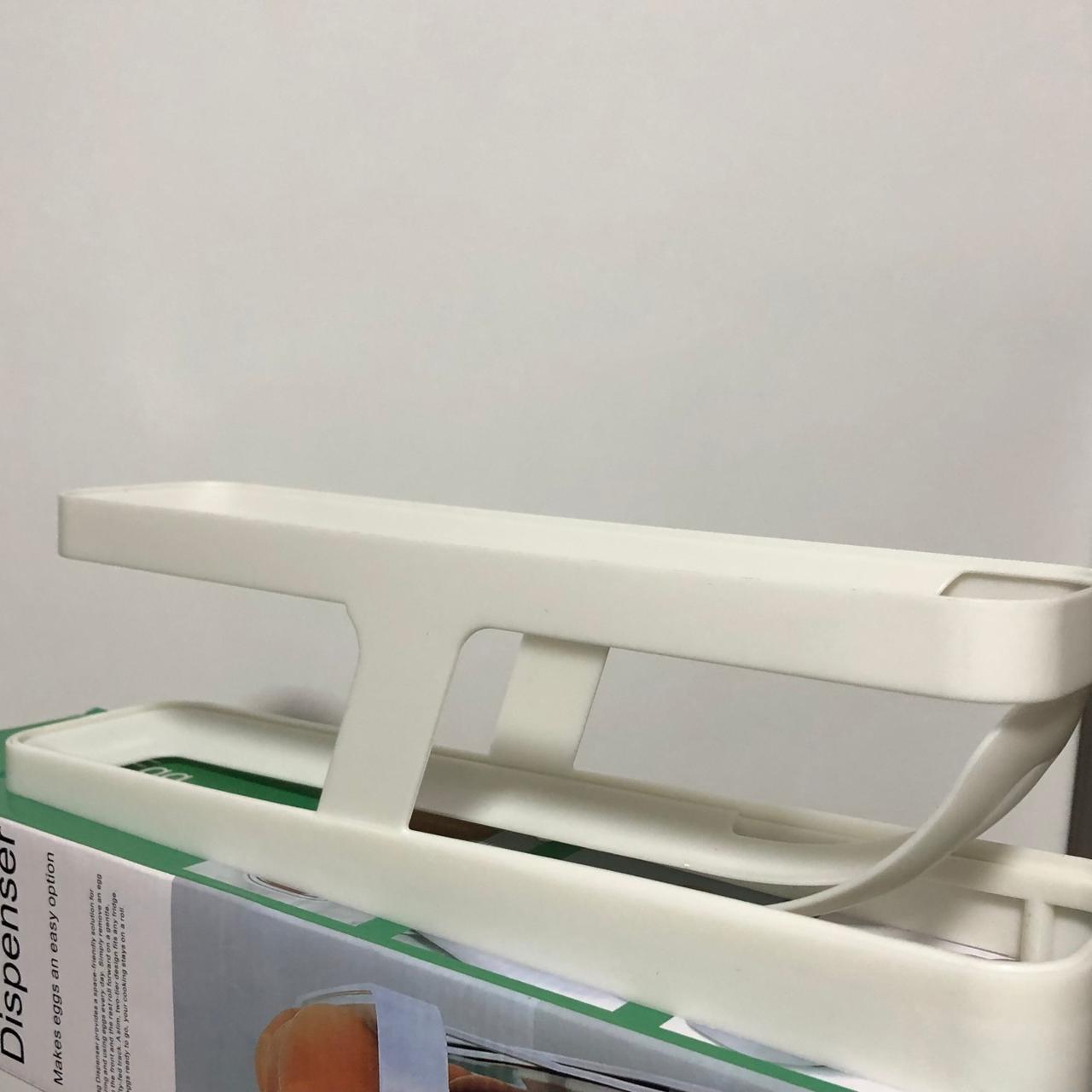 Dispensador de huevos.